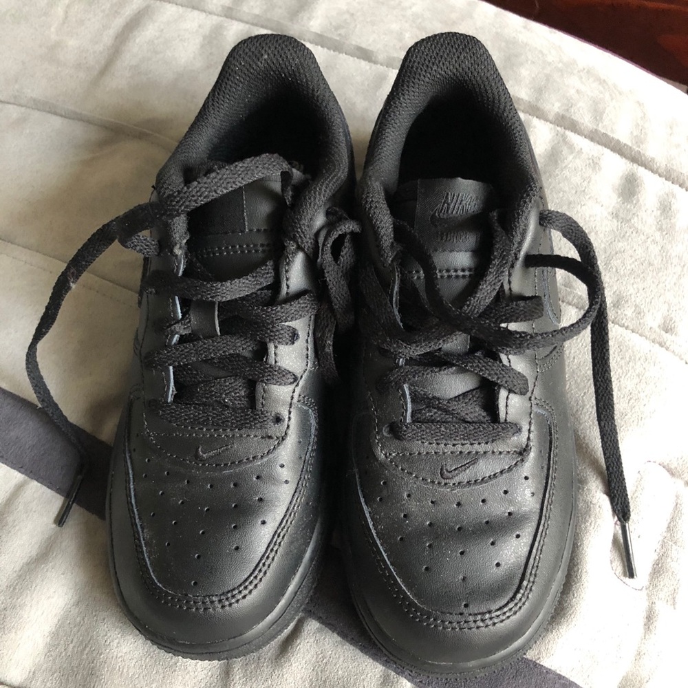 Boys black Nike sneakers size 1y.